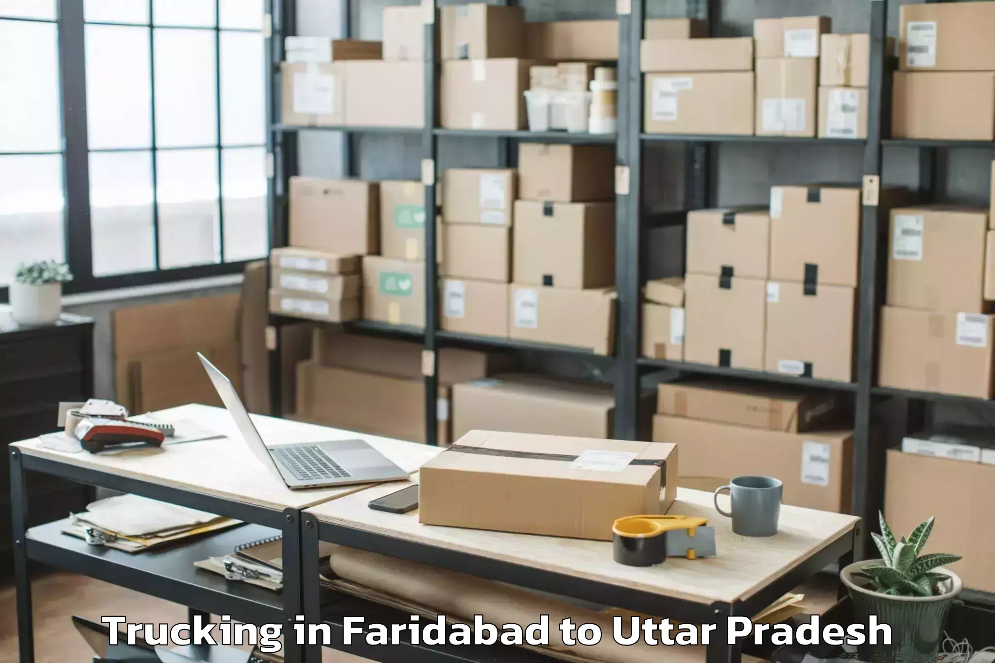 Top Faridabad to Khadda Trucking Available